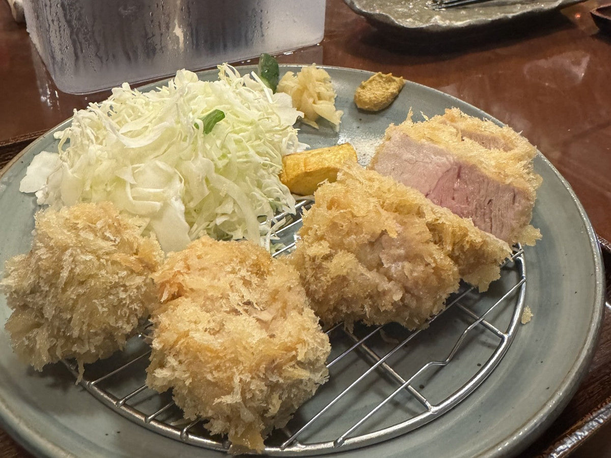 The cutlet and cabbage at the table.