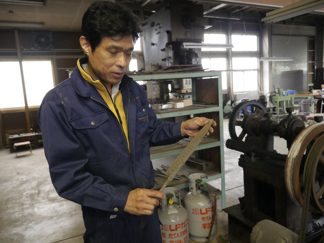 Nobuo Hanaki inspecting a forged blade at the Sukenari workshop, Toyama, April 2016